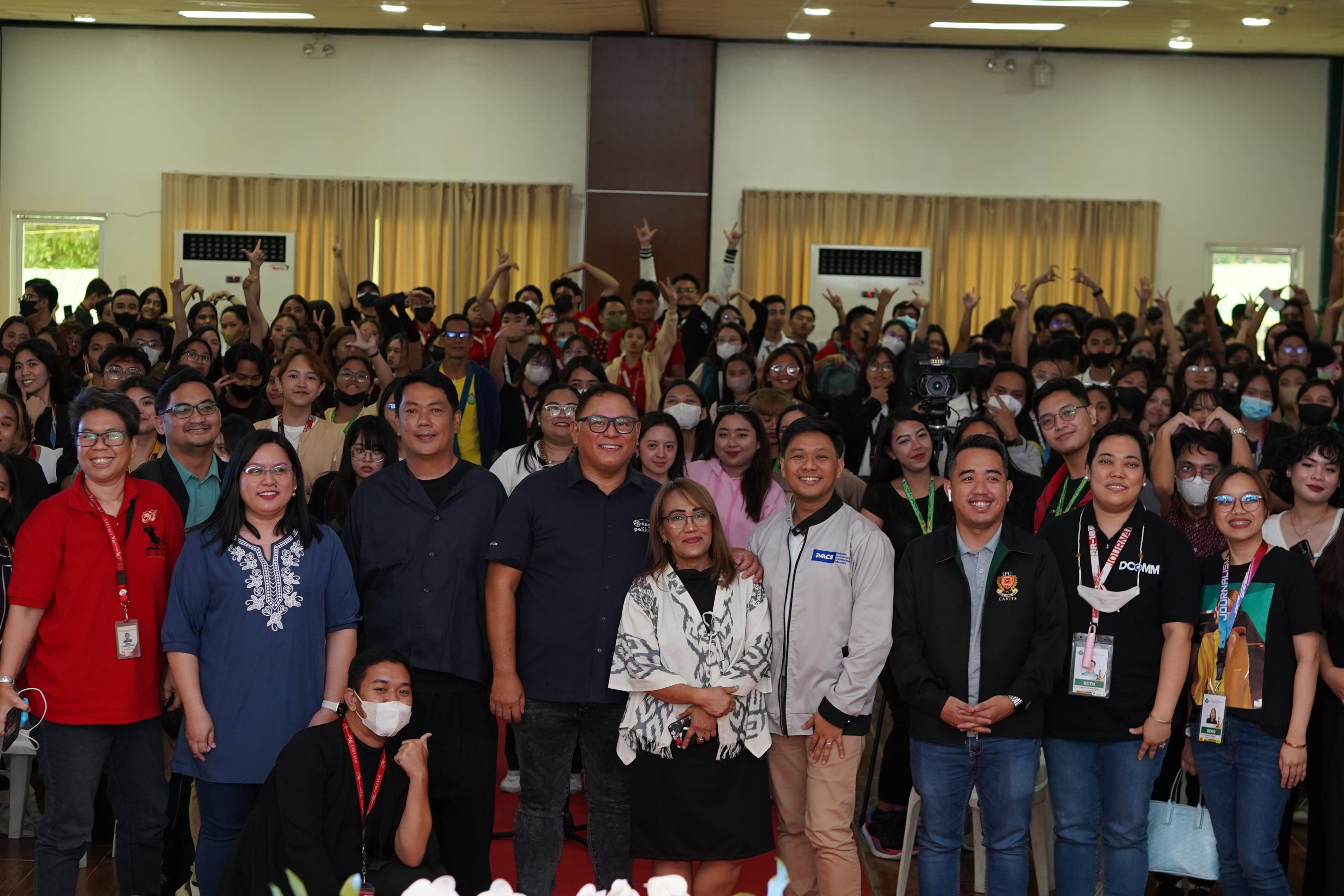 Speakers for Day 1 pose with the students at Cavite State University