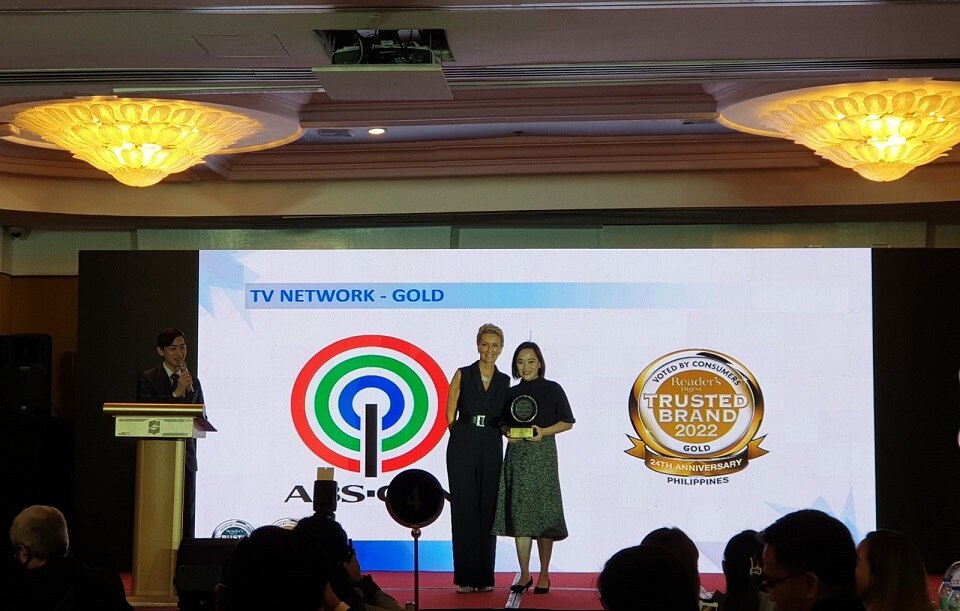 ABS CBN Trade Marketing and Partnerships head Aine Unson received ABS CBN's Gold Award