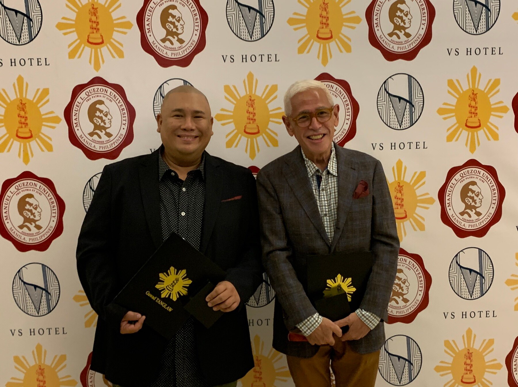 Chef Tatung Sarthou and Raul Manzano receive their shows' awards