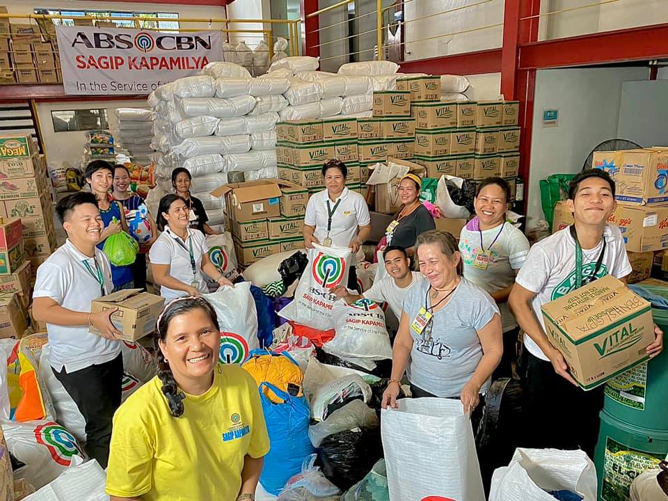 Volunteers and workers pack relif goods received from sponsors for Taal evacuees  Photo courtesy of ABS CBN Foundation's Facebook page