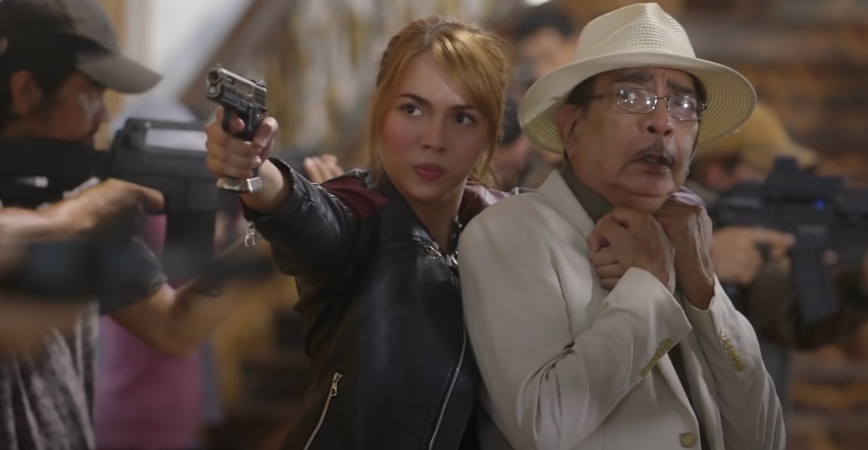Mara (Julia Montes) holds Don Ignacio (Tommy Abuel) hostage