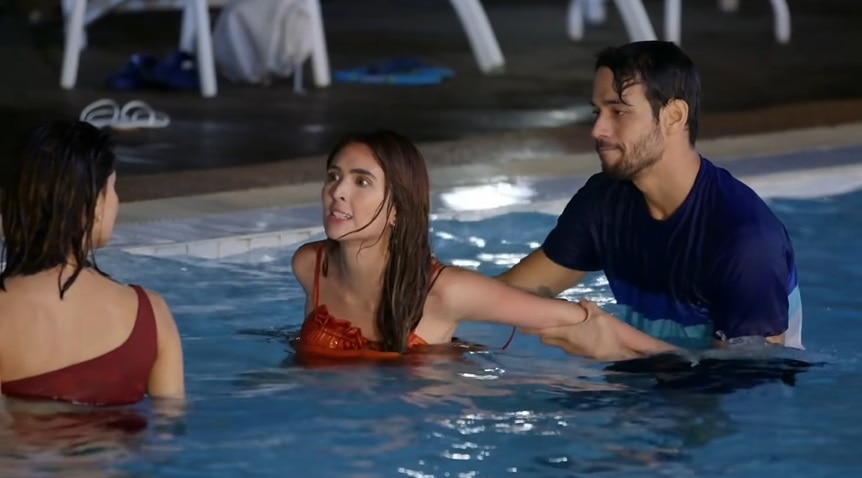 Lena (Erich) and Rachel (Sofia) fight in the pool over Miguel (Kit) (3)