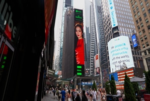 AC illuminates in New York Times Square billboard